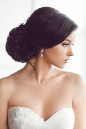 Beautiful bride. Wedding hairstyle make-up luxury fashion dress concept